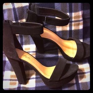 Black high heels and are a size 9